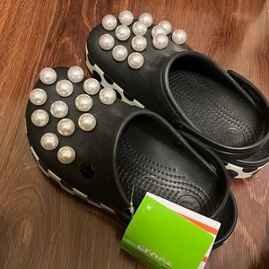 Super unique Crocs! NWT purchased in NYC and never worn. Size 5